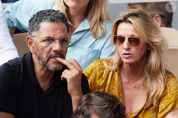 Roschdy Zem et sa compagne Sarah Lavoine - Célébrités en tribunes des Internationaux de France de tennis de Roland Garros 2023 à Paris le 11 juin 2023. © Jacovides-Moreau/Bestimage