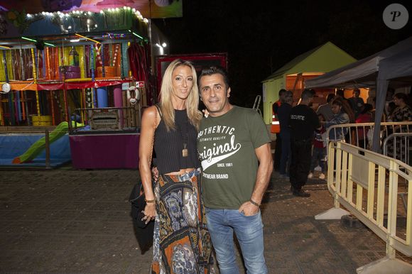 Albert Kassabi (Bébert des Forbans) et sa compagne Astrid lors de l'inauguration de la Fete à Neu-Neu au profit de l'association "Les puits du Désert " à Paris, le 30 août 2019.

@ Bestimage
