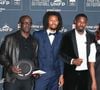 Lilian Thuram avec ses fils Khephren Thuram, Marcus Thuram, guest - Photocall de la cérémonie des Trophées UNFP au Pavillon Gabriel à Paris. © Coadic Guirec/Bestimage