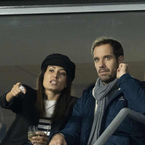 Richard Gasquet et sa compagne Clementine dans les tribunes lors de la demi-finale de la Coupe du Monde de Rugby opposant l'Argentine à la Nouvelle Zélande (6 - 44) au Stade de France à Saint-Denis, France, le 20 octobre 2023. © Cyril Moreau/Bestimage