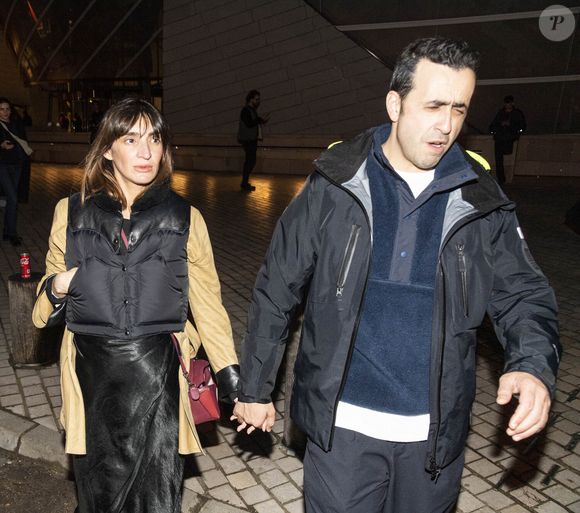 Exclusif - Jonathan Cohen et sa compagne Giulietta Canzani Mora Dj Piu Piu (enceinte) - Les célébrités au concert de Jay Z à la fondation Louis Vuitton à Paris, France, le 14 avril 2023. © Da Silva-Perusseau/Bestimage