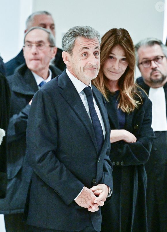 Nicolas Sarkozy et sa femme Carla Bruni - Nicolas Sarkozy condamné à 5 ans de prison à l'issue du procès de l'affaire du financement libyen au tribunal correctionnel de Paris, le 25 septembre 2025. L'ancien chef de l'Etat était accompagné de sa femme, C.Bruni. Nicolas Sarkozy, jugé coupable d’association de malfaiteurs, sera prochainement convoqué en vue de lui signifier la date de son incarcération. 
© Christian Liewig / Bestimage