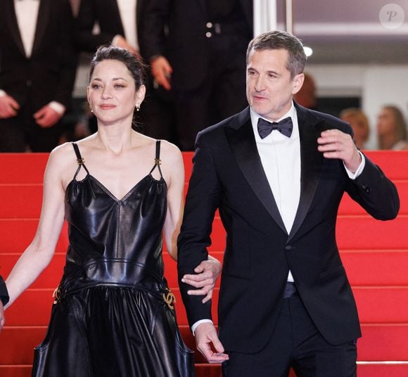 Marion Cotillard et Guillaume Canet - Descente des marches du film " Karma " lors du 79ème Festival International du Film de Cannes. © Jacovides-Moreau / Bestimage