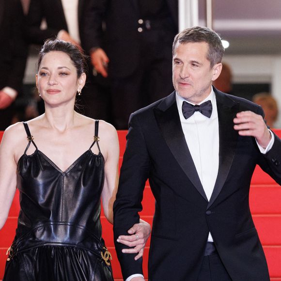 Marion Cotillard et Guillaume Canet - Descente des marches du film " Karma " lors du 79ème Festival International du Film de Cannes. © Jacovides-Moreau / Bestimage