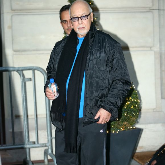 Rene Angelil, le mari de Celine Dion - Celine Dion et sa famille a la sortie de leur hotel a Paris. La diva Quebecoise a fini sa tournee et quitte la France. le 7 decembre 2013