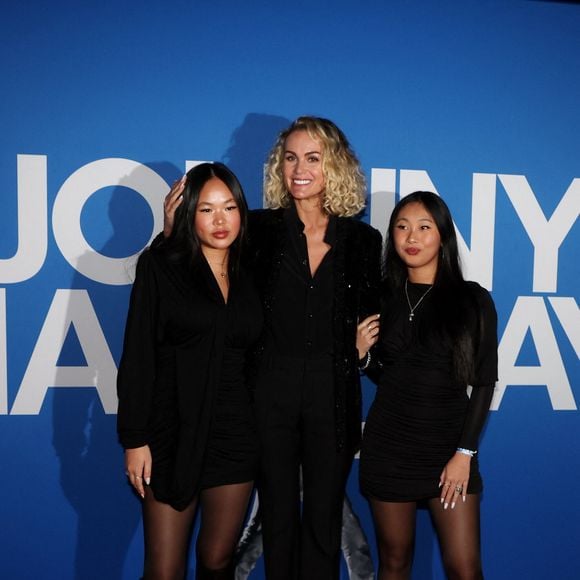 Laeticia Hallyday et ses filles Joy et Jade - Photocall du vernissage de l'exposition "Johnny Hallyday, l'exposition" au Palais des Expositions à Paris. Le 21 décembre 2023
© Dominique Jacovides / Bestimage