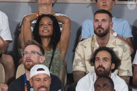 Très impliqué, le compagnon de Christina Milian a activement retravaillé le logo, le merchandising et l'expérience spectateurs.

Matt Pokora  et sa femme Christina Milian dans les tribunes lors des Internationaux de France de Tennis de Roland Garros 2026. Paris, le 25 mai 2026.

© Moreau / Jacovides / Bestimage