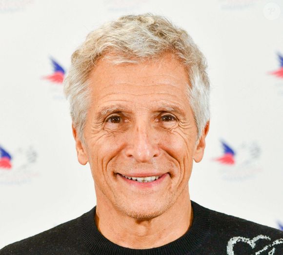 À la fin de l’émission diffusée vendredi 22 mai 2026 sur France 2, l’animateur de 64 ans a annoncé que le célèbre karaoké quotidien allait être déprogrammé pendant plusieurs semaines. 

Nagui lors de la célébration du 80ème anniversaire du Secours Populaire à l'UNESCO à Paris, France. Photo par Shootpix/Abaca