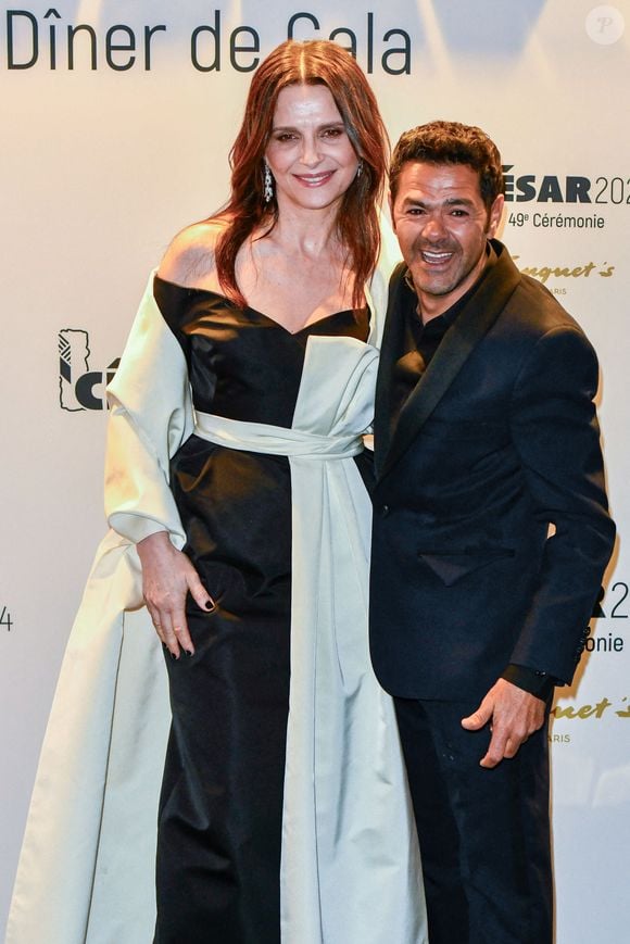 Juliette Binoche et Jamel Debbouze arrivent au 49e dîner des César au Fouquet's le 23 février 2024 à Paris, France Photo Shootpix/ABACAPRESS.COM
