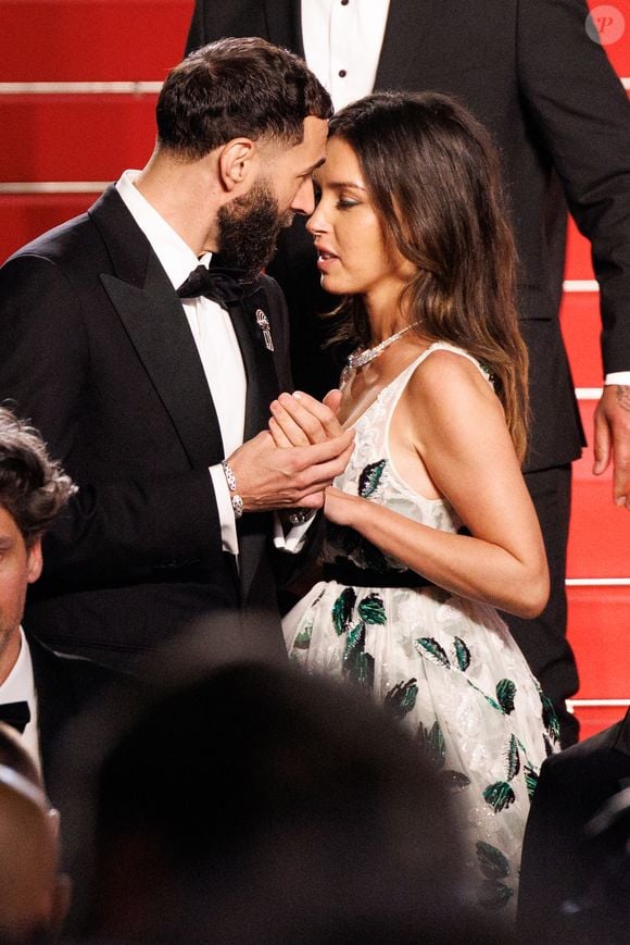 Karim Benzema et sa compagne Lyna Khoudri à la descente des marches du film « 13 jours 13 nuits » lors du 78e Festival International du Film de Cannes le 23 mai 2025
© © Jacovides-Moreau / Bestimage / Bestimage