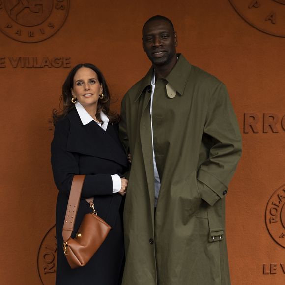 Omar Sy et sa femme Helene au village lors des Internationaux de France de Tennis de Roland Garros 2025, à Paris, France, le 7 juin 2025. © Cyril Moreau/Bestimage