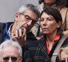 L'avocate de Michel Cymes, Florence Watrin, a ainsi précisé que deux plaintes étaient en cours, une première visant les propos tenus par Cyril Hanouna sur Europe 1 et une autre pour ceux prononcés sur C8, que l'Arcom serait saisi.
Michel Cymes avec sa femme Nathalie dans les tribunes des Internationaux de France de tennis de Roland Garros 2024 à Paris, France, le 31 mai 2024. © Jacovides-Moreau/bestimage