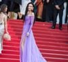Pour la montée des marches de "La Vie d’une Femme", elle a opté pour une robe violette transparente signée Gucci, inspirée d’un look qu’elle portait déjà en 2003 à l’avant-première de "Matrix Reloaded"

Demi Moore - Montée des marches du film " La vie d'une femme " lors du 79ème Festival International du Film de Cannes, le 13 mai 2026. © Jacovides-Moreau / Bestimage