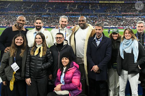 Et d'autres champions présents au match ont posé ensemble

Boris Diaw, Nikola Karabatic, Luka Karabatic, Teddy Riner, Tony Estanguet, Amélie Mauresmo au match de rugby du Tournoi des Six Nations France contre Angleterre au Stade de France à Saint-Denis le 14 mars 2026

© Lionel Urman / Bestimage