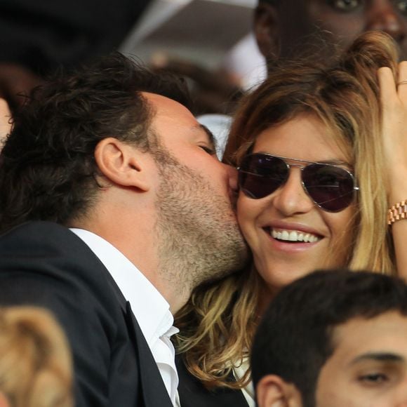 Michael Youn et sa compagne Isabelle Funaro - People au match du championnat de France de football entre le PSG et AC Ajaccio au Parc des Princes, le 18 aout 2013. (Marc Ausset Lacroix / Bestimage).