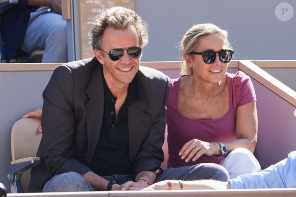 Anne-Sophie Lapix et son mari Arthur Sadoun - Célébrités dans les tribunes des Internationaux de France de tennis de Roland Garros 2024 à Paris le 7 juin 2024.  © Jacovides-Moreau/Bestimage