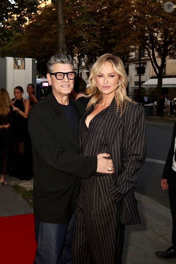 Marc Lavoine et sa compagne Adriana Karembeu arrivant au "Concerto pour la Paix" organisé par Omar Harfouch au Théâtre des Champs Élysées à Paris, France, le 18 Septembre 2024.  © Perusseau / Tribeca / Bestimage