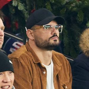 Florent Manadou, né non loin de Lyon, a assisté à la défaite de l'OL, face au PSG.
Florent Manaudou dans les tribunes du match de Ligue 1 McDonald's opposant le Paris Saint-Germain (PSG) à Lyon (3-1) au Parc des Princes à Paris le 15 décembre 2024.