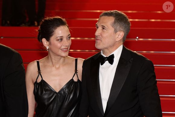 Marion Cotillard et Guillaume Canet - Descente des marches du film " Karma " lors du 79ème Festival International du Film de Cannes. © Jacovides-Moreau / Bestimage