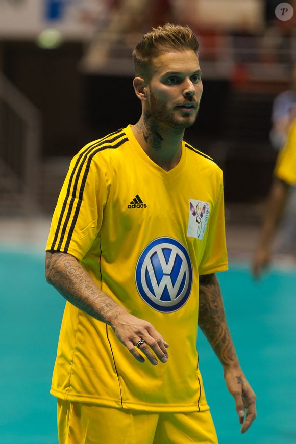 Amoureux de football, il a naturellement tenté d'investir dans le sport.
M. Pokora jouant un match de football pour la 6e édition du 'Foot Concert' organisé par l'association Huntington Avenir, qui s'est tenu au Palais des sports de Gerland, à Lyon, en France, le 13 octobre 2012. Photo Nicolas Genin/ABACAPRESS.COM