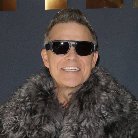 Ce jour-là, il présentait son premier film, intitulé Better Man, lors d'une grande avant-première organisée au Grand Rex

Robbie Williams - Avant-première du film "Better Man" au Grand Rex à Paris. Le 13 décembre 2024
© Coadic Guirec / Bestimage