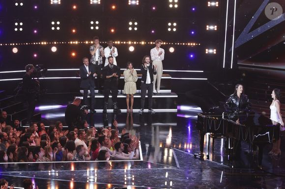 Les trois coachs, M. Pokora, Jenifer et Patrick Fiori, s’étaient retournés lors de son audition à l’aveugle.


Nikos Aliagas, Slimane - Enregistrement de l'émission "Star Academy", diffusée en direct le 5 novembre sur TF1
© Jack Tribeca / Bestimage