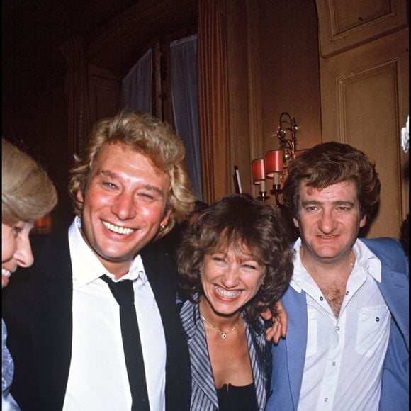 Archives - Johnny Hallyday avec Nathalie Baye et Eddy Mitchell, le soir de la première de son concert au Palais des Sports "Le Survivant (RINDOFF-PATERSON / BESTIMAGE).