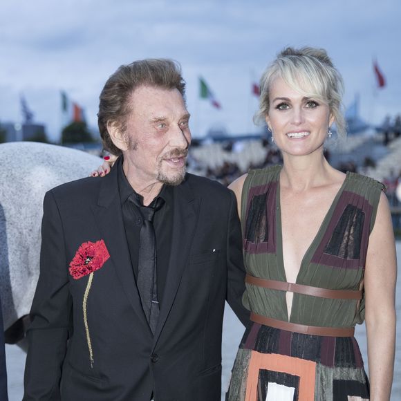 Johnny Hallyday et sa femme Laeticia Hallyday - Remise du Prix Eiffel avec Johnny et Laeticia Hallyday - Record du saut en hauteur de la ville de Paris / EOS - Longines Paris Eiffel Jumping à la plaine de Jeux de Bagatelle à Paris le 1er juillet 2016. Cette remise de prix est le prologue de la soirée au profit de l'association "La bonne étoile" de Laeticia Hallyday.
© Olivier Borde / Veeren / Bestimage
