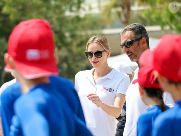 La princesse Charlène de Monaco et Pierre Frolla lors de la journée "Water Safety Day, pour la prévention de la noyade" sur la plage du Larvotto de Monaco, le 17 juin 2025. Cet événement est organisé par sa Fondation, le Centre de Sauvetage Aquatique de Monaco (CSAM) en partenariat avec la Croix-Rouge monégasque. © Claudia Albuquerque/Bestimage