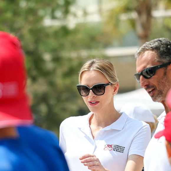 La princesse Charlène de Monaco et Pierre Frolla lors de la journée "Water Safety Day, pour la prévention de la noyade" sur la plage du Larvotto de Monaco, le 17 juin 2025. Cet événement est organisé par sa Fondation, le Centre de Sauvetage Aquatique de Monaco (CSAM) en partenariat avec la Croix-Rouge monégasque. © Claudia Albuquerque/Bestimage
