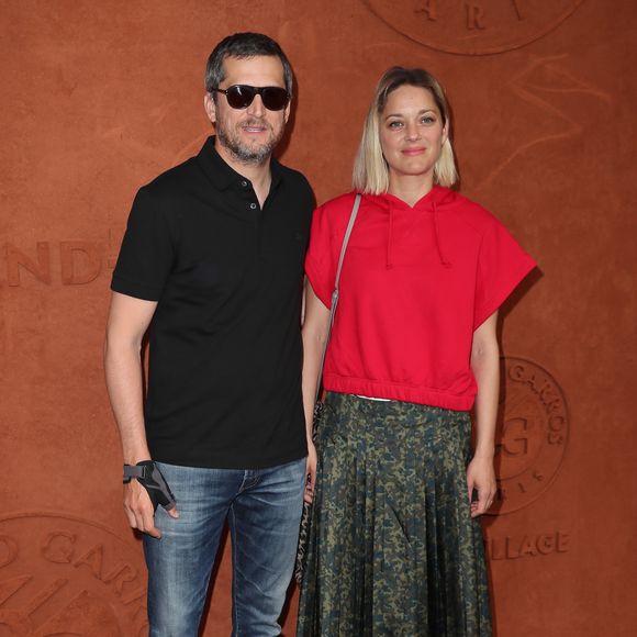 Guillaume Canet et Marion Cotillard au village lors des internationaux de tennis de Roland Garros à Paris, le 10 juin 2018.
© Moreau-Jacovides/Bestimage