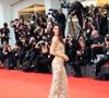 Kendall Jenner l’a associée à des sandales beiges, des bijoux discrets et une mise en beauté naturelle.

Kendall Jenner sur le tapis rouge du film ''Wild Horse Nine,'' au 83eme Festival de Venise. ©SGPItalia