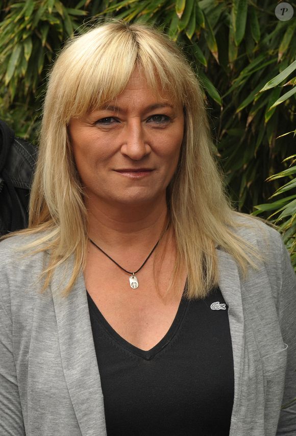 Christine Bravo et son petit ami arrivent à l'espace VIP 'Le Village' pendant les Internationaux de France de Tennis 2009 à Roland Garros à Paris, France le 6 juin 2009. Photo by Gorassini-Guignebourg/ABACAPRESS.COM