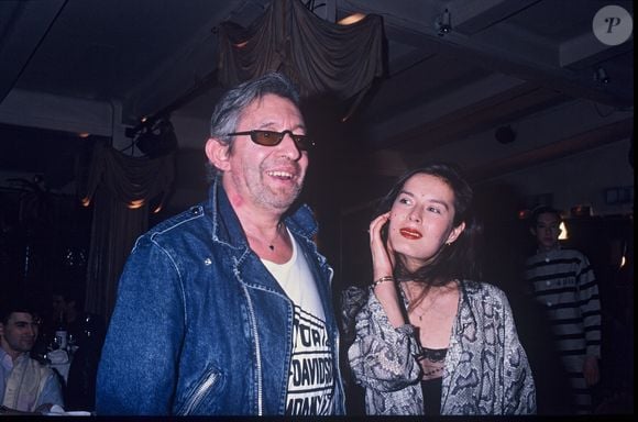 Serge Gainsbourg et Bambou lors d'une soirée au Palace à Paris en 1988 © AGENCE / BESTIMAGE