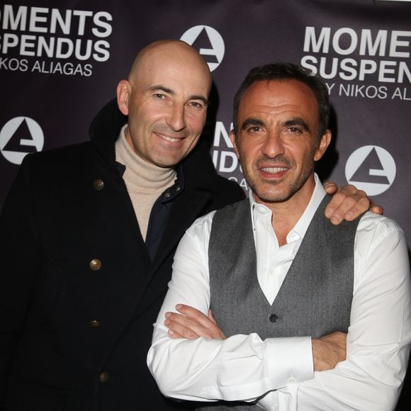 Exclusif - Nikos Aliagas et Nicolas Canteloup - Vernissage de l'exposition "Moments Suspendus" de Nikos Aliagas à l'Atlantis Hall à Boulogne-Billancourt, le 3 décembre 2014.