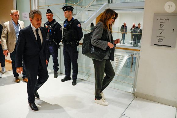 Nicolas Sarkozy et sa femme Carla Bruni à la sortie du dernier jour du procès pour des accusations de financement illégal de la campagne présidentielle victorieuse de 2007, décision le 25 septembre pour Nicolas Sarkozy et ses coprévenus, au tribunal de Paris, France, le 8 avril 2025. © Christophe Clovis/Bestimage
