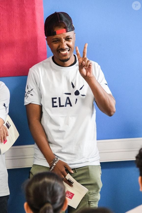Il a précisé : "

Le chanteur Soprano lors de la lecture de la dictée ELA aux élèves de la 6ème F du collège Henri Barnier, à Marseille, le 18 octobre 2022.

Photo : Agence / Bestimage