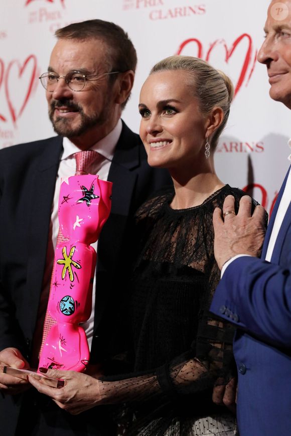 Exclusif - Dr Olivier Courtin-Clarins (président du directoire de Clarins), Laeticia Hallyday ("Femme de Coeur 2017" par Clarins pour son engagement humanitaire) et Christian Courtin-Clarins (président du conseil de surveillance de Clarins) - Le Prix Clarins pour l'enfance fête ses 20 ans et récompense sa nouvelle femme de coeur Laeticia Hallyday pour son association La Bonne Étoile à l'hôtel Salomon de Rothschild à Paris, France, le 14 mars 2017. 
 © Borde-Jacovides/Bestimage