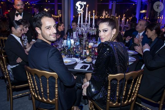 Iris Mittenaere  (Miss France et Miss Univers 2016) et Diego El Glaoui - Dîner de gala de l’association AEM (Un Avenir pour les Enfants du Monde) au bénéfice des enfants du Rwanda organisé par B.Djian au Pavillon Ledoyen à Paris, France, le 12 décembre 2019. Chaque année avant les fêtes, B.Djian mobilise la mode, le temps d’un dîner caritatif au profit des enfants du Rwanda. La directrice de la rédaction de Numéro Magazine associe à la cause de l’association AEM, les grandes maisons de couture française. © Olivier Borde/Bestimage