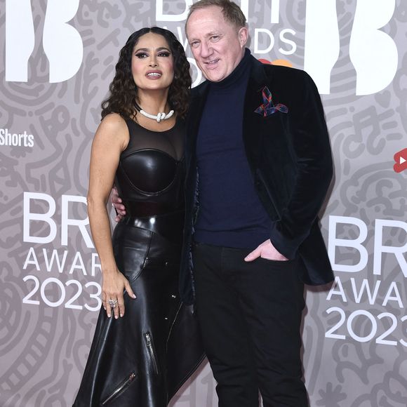 Salma Hayek et son mari Francois-Henri Pinault au photocall de la cérémonie des Brit Awards 2023 à l'O2 Arena à Londres le 11 février 2023. Action Press / Bestimage
