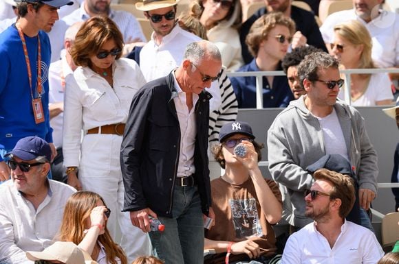 Gilles Bouleau et son épouse Elisabeth Tran-Bouleau dans les tribunes lors des Internationaux de France de tennis à Roland Garros le 28 mai 2022 à Paris, France. Photo by Laurent Zabulon/ABACAPRESS.COM