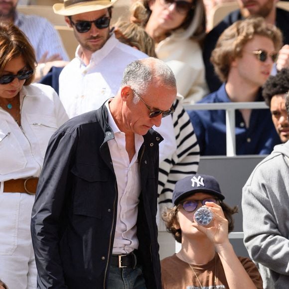 Gilles Bouleau et son épouse Elisabeth Tran-Bouleau dans les tribunes lors des Internationaux de France de tennis à Roland Garros le 28 mai 2022 à Paris, France. Photo by Laurent Zabulon/ABACAPRESS.COM
