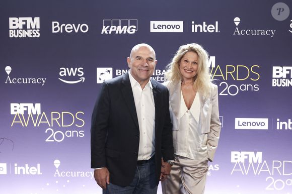 Vincent Moscato et sa femme Krystel au photocall de la cérémonie des BFM awards au Grand Palais à Paris le 13 janvier 2025.

© Jack Tribeca / Bestimage