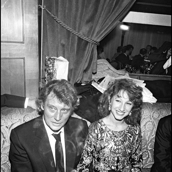 Archives - Johnny Hallyday et Nathalie Baye lors de la soirée des César 1983.  (AGENCE / BESTIMAGE).
