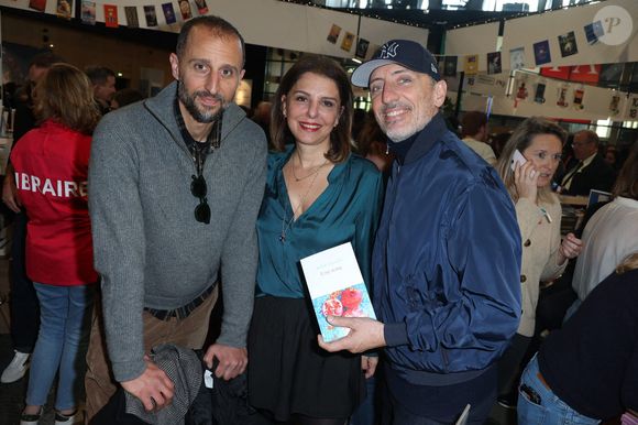 Le plus jeune de la fratrie Elmaleh n'est à l'époque pas encore très connu du grand public, à l'inverse de Virginie Ledoyen qui a déjà joué dans le blockbuster "La Plage"...

Arié Elmaleh, Judith Elmaleh et Gad Elmaleh pendant le Festival du livre de Paris, le 22 avril 2023, Paris, France. Photo Jerome Dominé/Abaca