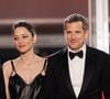 C’est une séquence inattendue qu’a offerte Guillaume Canet lors d’une conférence de presse au Festival de Cannes pour la projection de son film "Karma", avec Marion Cotillard en tête d’affiche.

Marion Cotillard et Guillaume Canet - Descente des marches du film " Karma " lors du Festival International du Film de Cannes. © Jacovides-Moreau / Bestimage