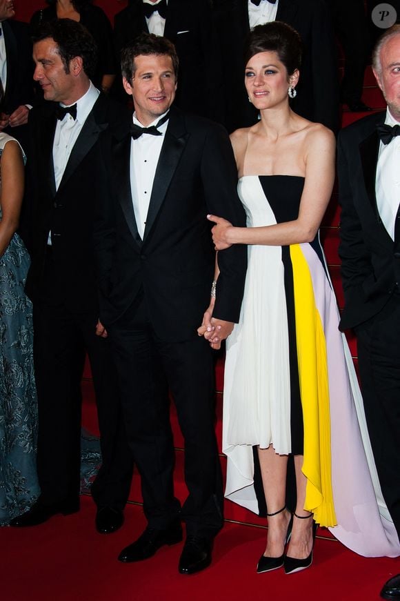 Clive Owen, Marion Cotillard et Guillaume Canet quittent la projection de "Blood Ties" au Palais des Festivals dans le cadre du 66ème Festival de Cannes à Cannes, France, le 20 mai 2013. Photo par Nicolas Genin/ABACAPRESS.COM