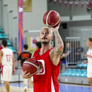 En 2023, le chanteur de 40 ans a injecté la somme de 300 000 euros dans le club de basket de la SIG Strasbourg.

Tony Parker et Matt Pokora s'affrontent lors d'un match de basket par équipes dans le cadre d'une animation Radio Scoop au Gymnase Mado Bonnet à Lyon le 26 octobre 2023.

© Bestimage