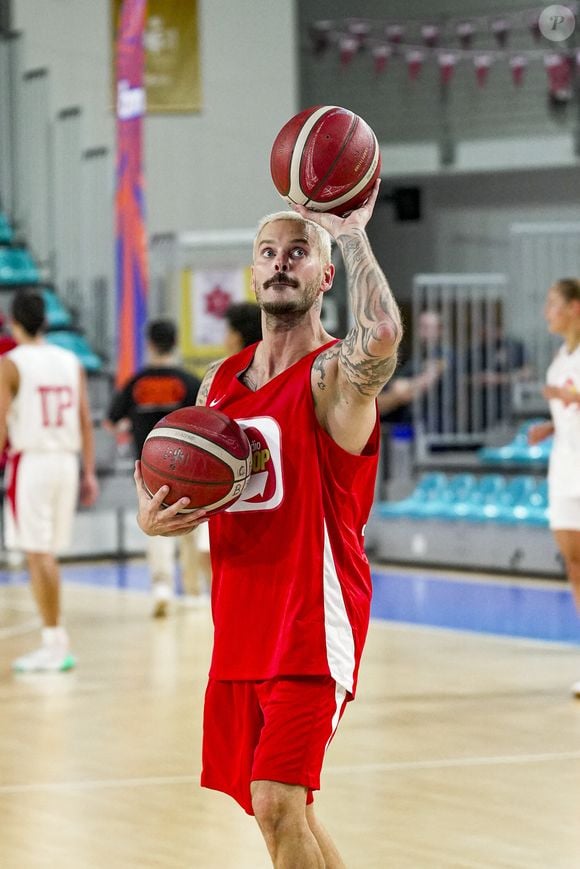 En 2023, le chanteur de 40 ans a injecté la somme de 300 000 euros dans le club de basket de la SIG Strasbourg.

Tony Parker et Matt Pokora s'affrontent lors d'un match de basket par équipes dans le cadre d'une animation Radio Scoop au Gymnase Mado Bonnet à Lyon le 26 octobre 2023.

© Bestimage