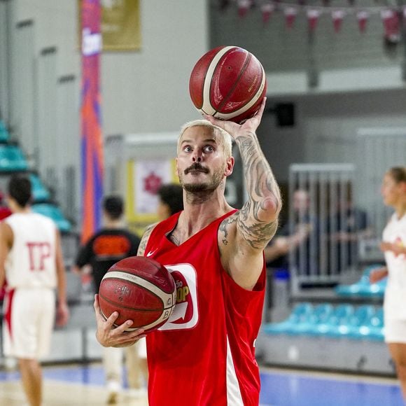 En 2023, le chanteur de 40 ans a injecté la somme de 300 000 euros dans le club de basket de la SIG Strasbourg.

Tony Parker et Matt Pokora s'affrontent lors d'un match de basket par équipes dans le cadre d'une animation Radio Scoop au Gymnase Mado Bonnet à Lyon le 26 octobre 2023.

© Bestimage
